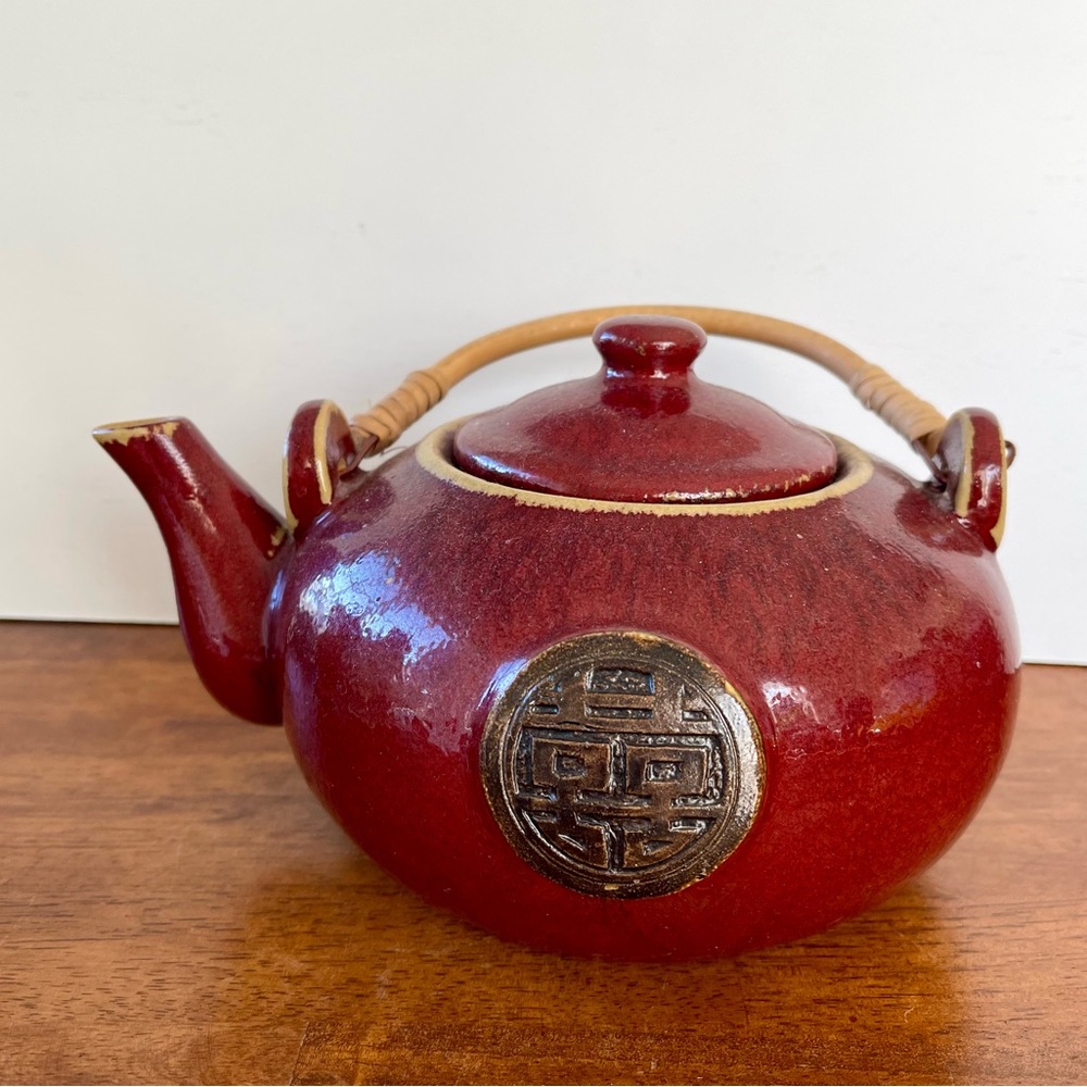 Burgundy Ceramic Asian Teapot With Bamboo Handle Metal Side Plaque